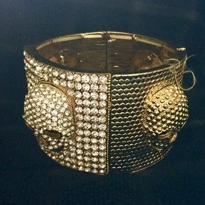 Gold Tone Skull Wise Elastic Thick Bangle